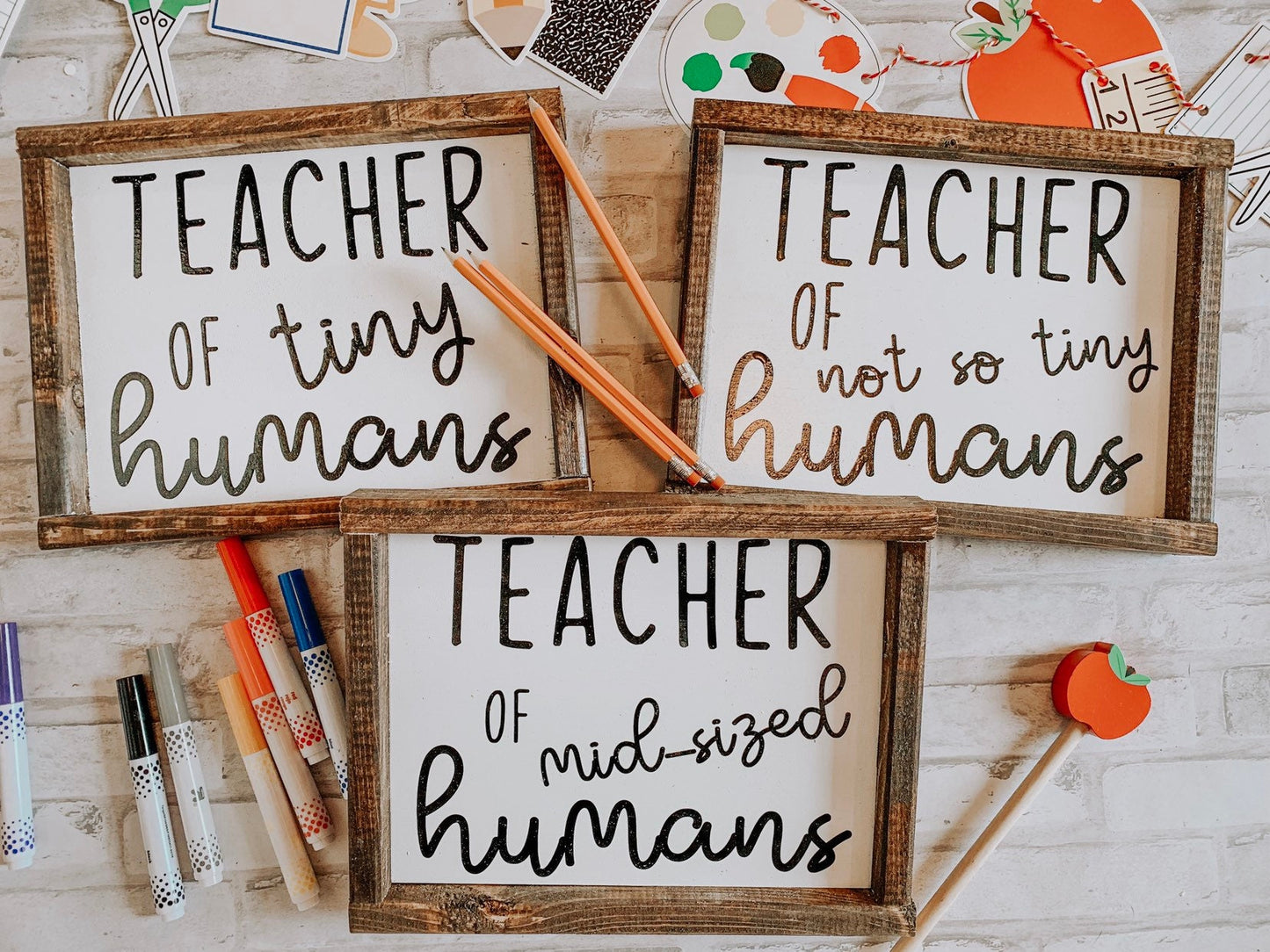 Teacher of mid-sized Humans sign