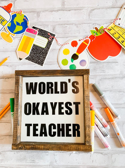 World's Okayest Teacher sign